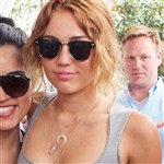 Miley Cyrus Shows Off Her Tight Body In A Short Dress